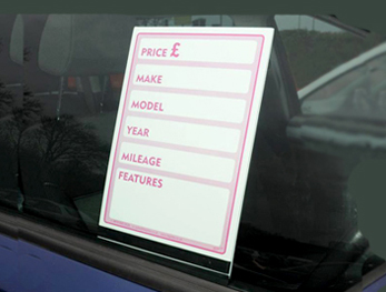 Specification sheet holders and mirror hangers